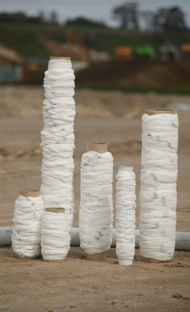 Long-Term Steady-State Flow Performance in Subsoil Drainage using Filter Sleeve and Non-woven geotextiles